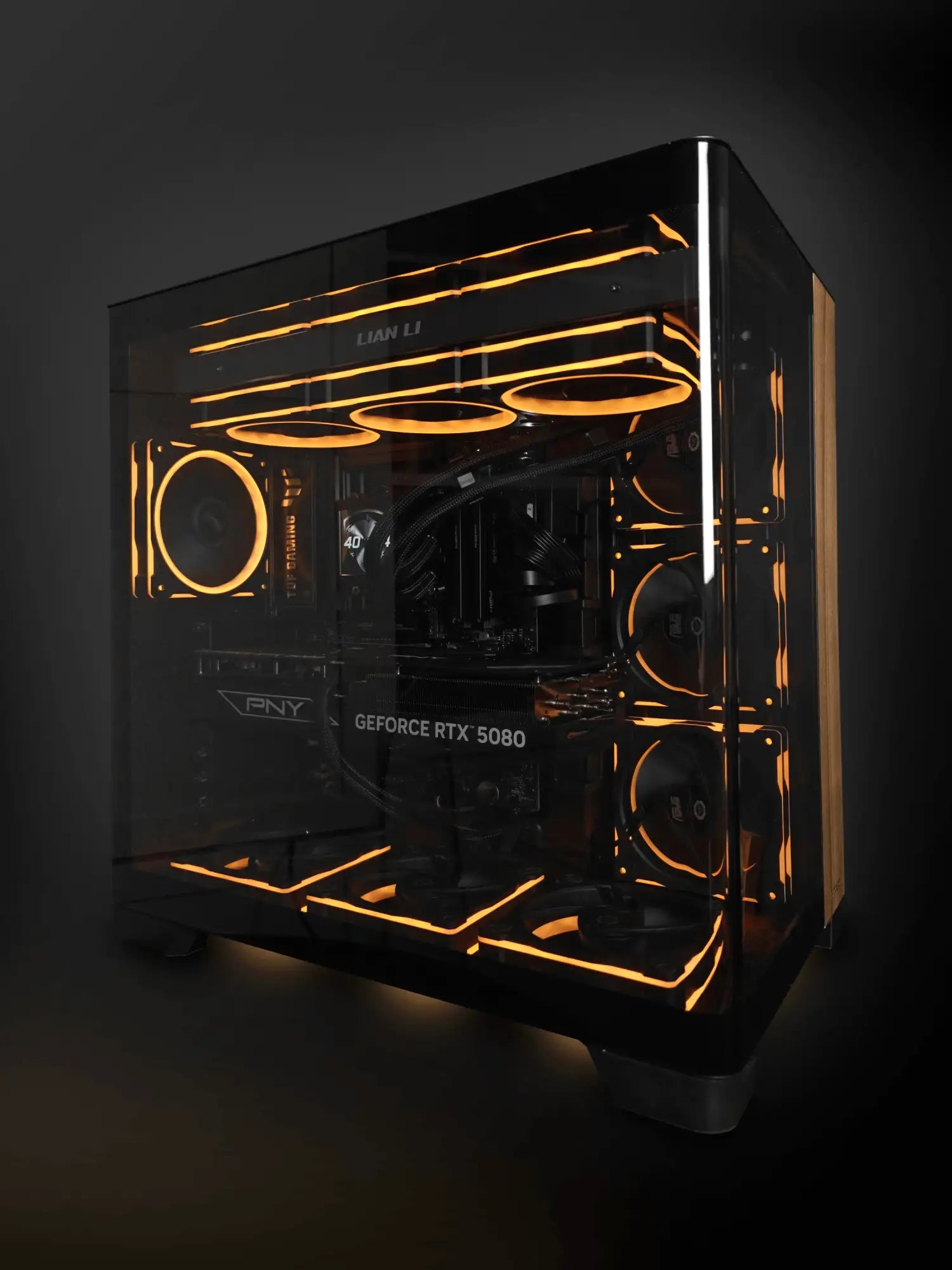Product rendering of an Alpha PC tower with orange liquid-cooling lines