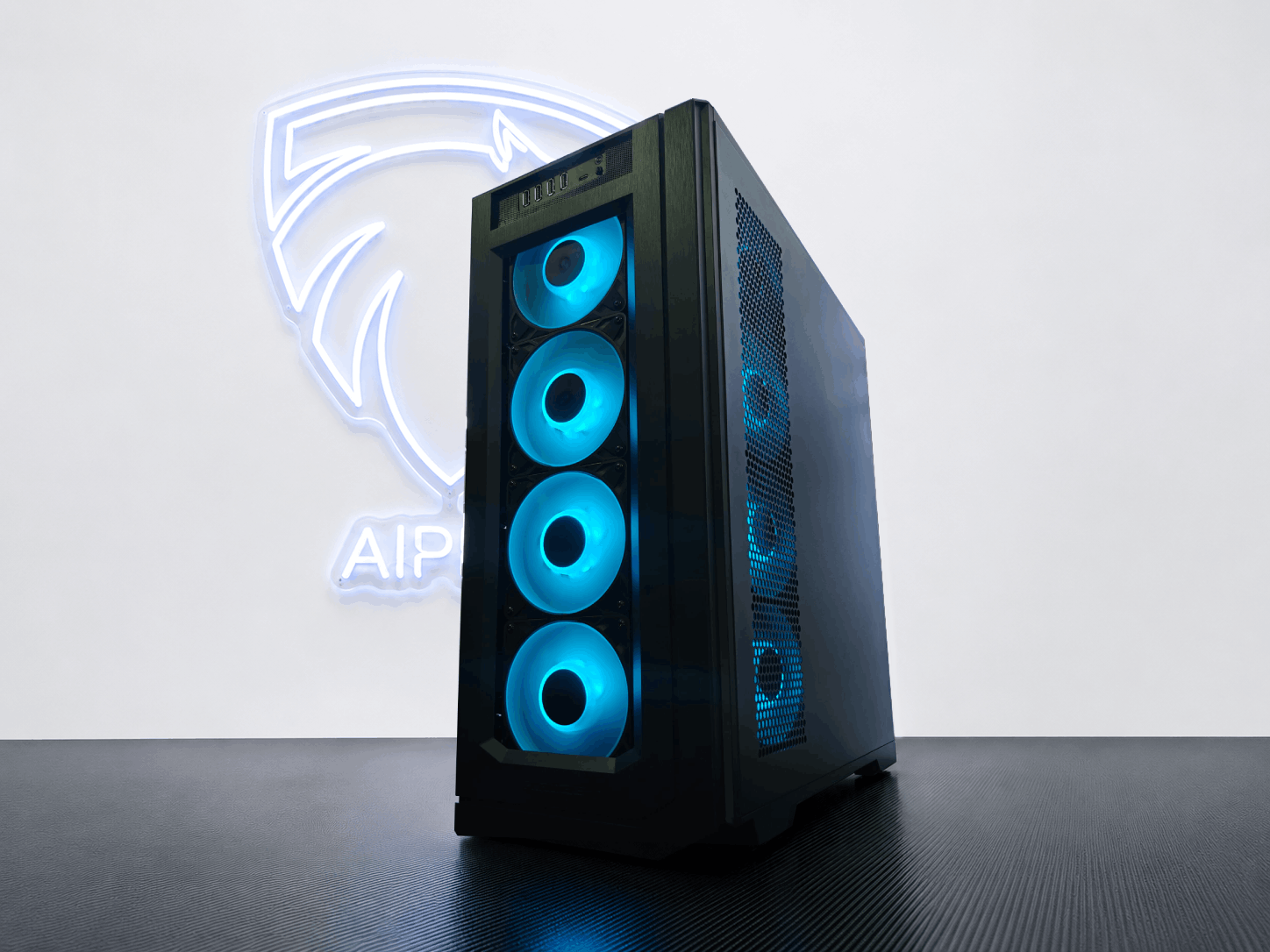 Black Alpha PC tower photographed against the Alpha PC studio wall