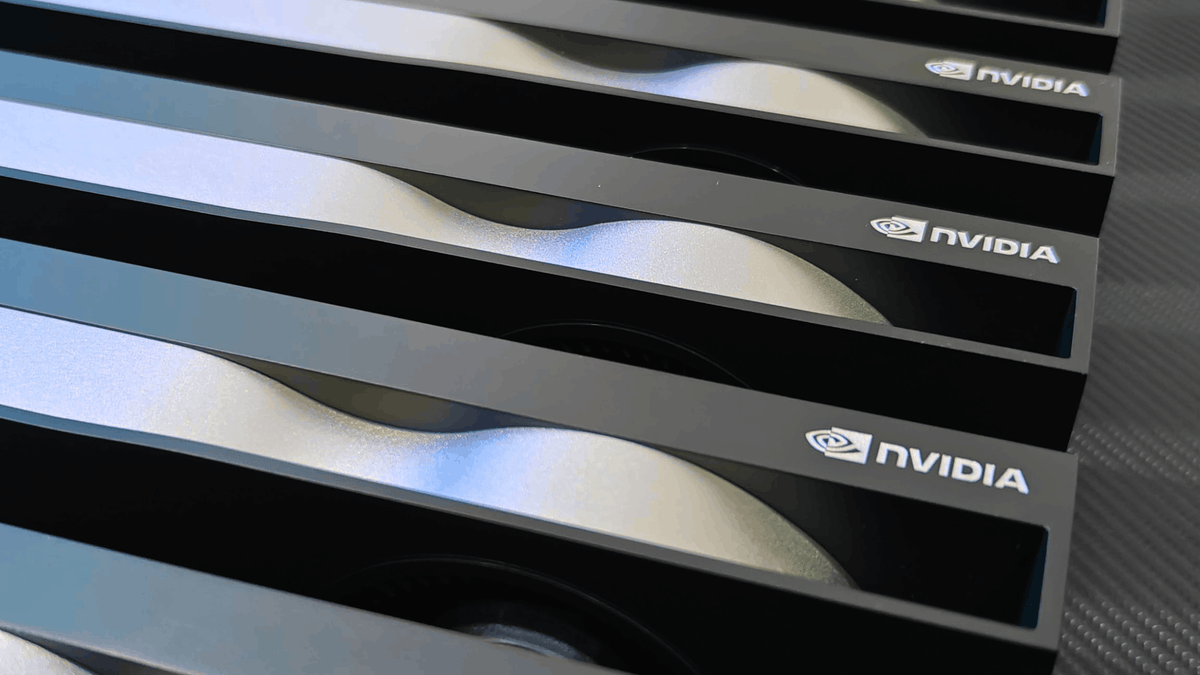 Close-up of multiple NVIDIA-branded graphics card cooling fins or heat pipes arranged diagonally, showing black and silver metallic surfaces.