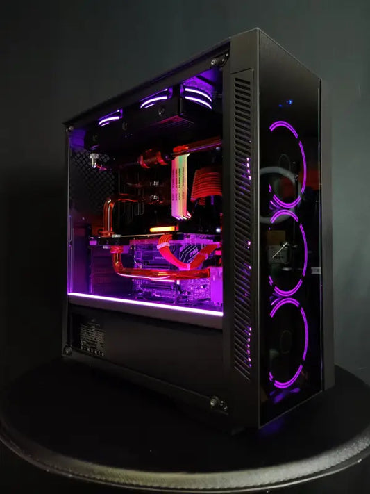 Custom liquid cooled gaming PC with purple LED lighting and advanced cooling system