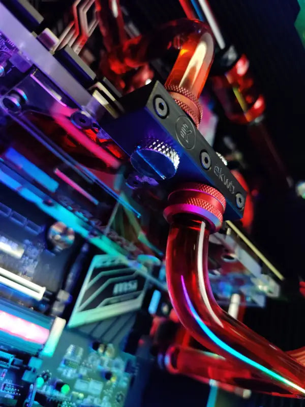 Custom liquid cooled gaming PC with purple LED lighting for optimal performance