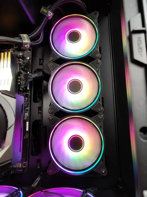 Three RGB computer fans in the Illuminated Werewolf Gaming Tower with RTX 3060 and 32GB RAM