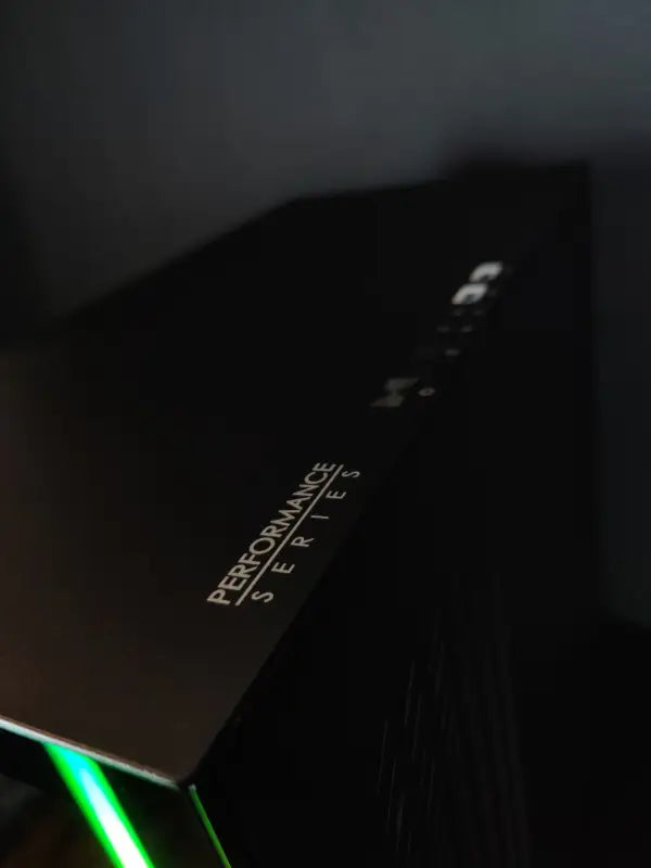 Illuminated Werewolf Gaming Tower with RTX 3060, featuring green lighting and 32GB RAM