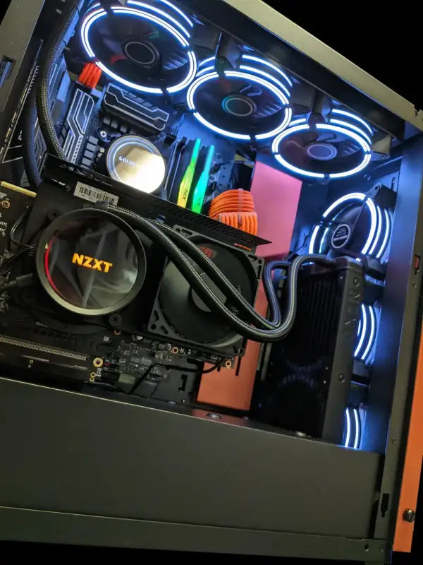 Illuminated computer components in a powerful liquid cooled gaming computer tower