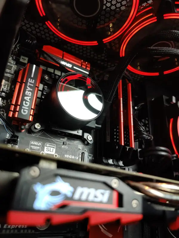 Computer components with red accents in the Phoenix Gaming PC featuring 16GB RAM
