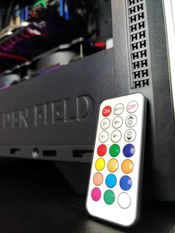 White remote control with color buttons for Silver Shark i7 Gaming Workstation