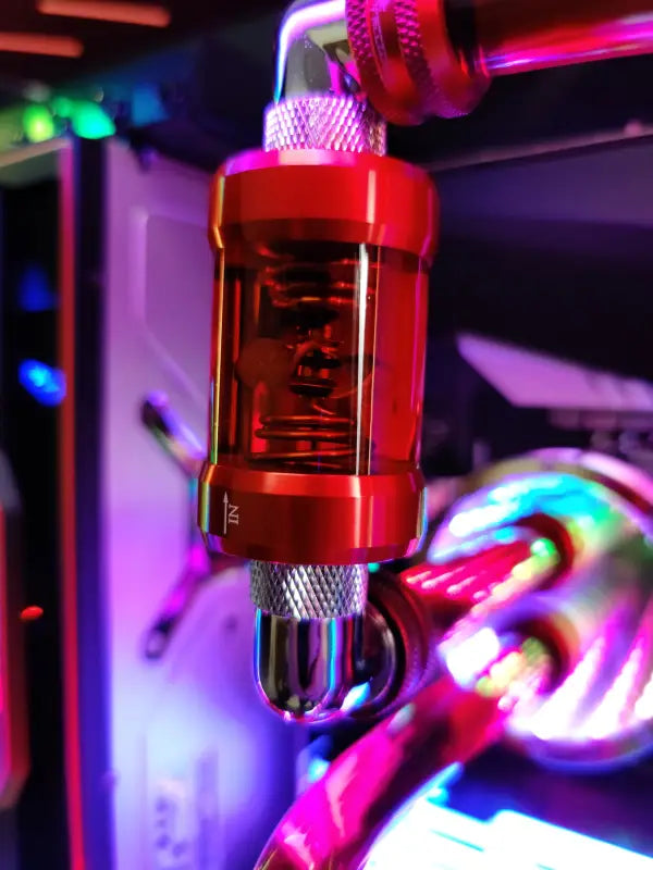 Red liquid cooling flow indicator in Silver Wolf AMD Gaming PC with Liquid Cooling