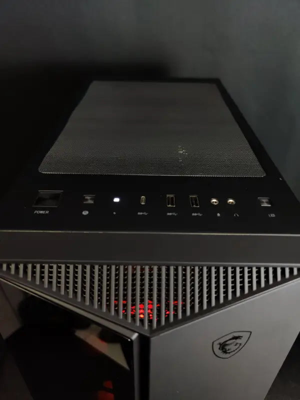 Black MSI gaming computer tower in Silverback Video Editing Gaming Workstation with red LEDs